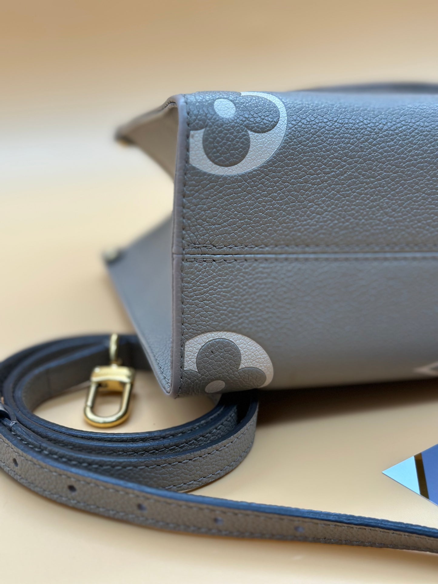 LV OTG BI-COLOR EMPREINTE PM