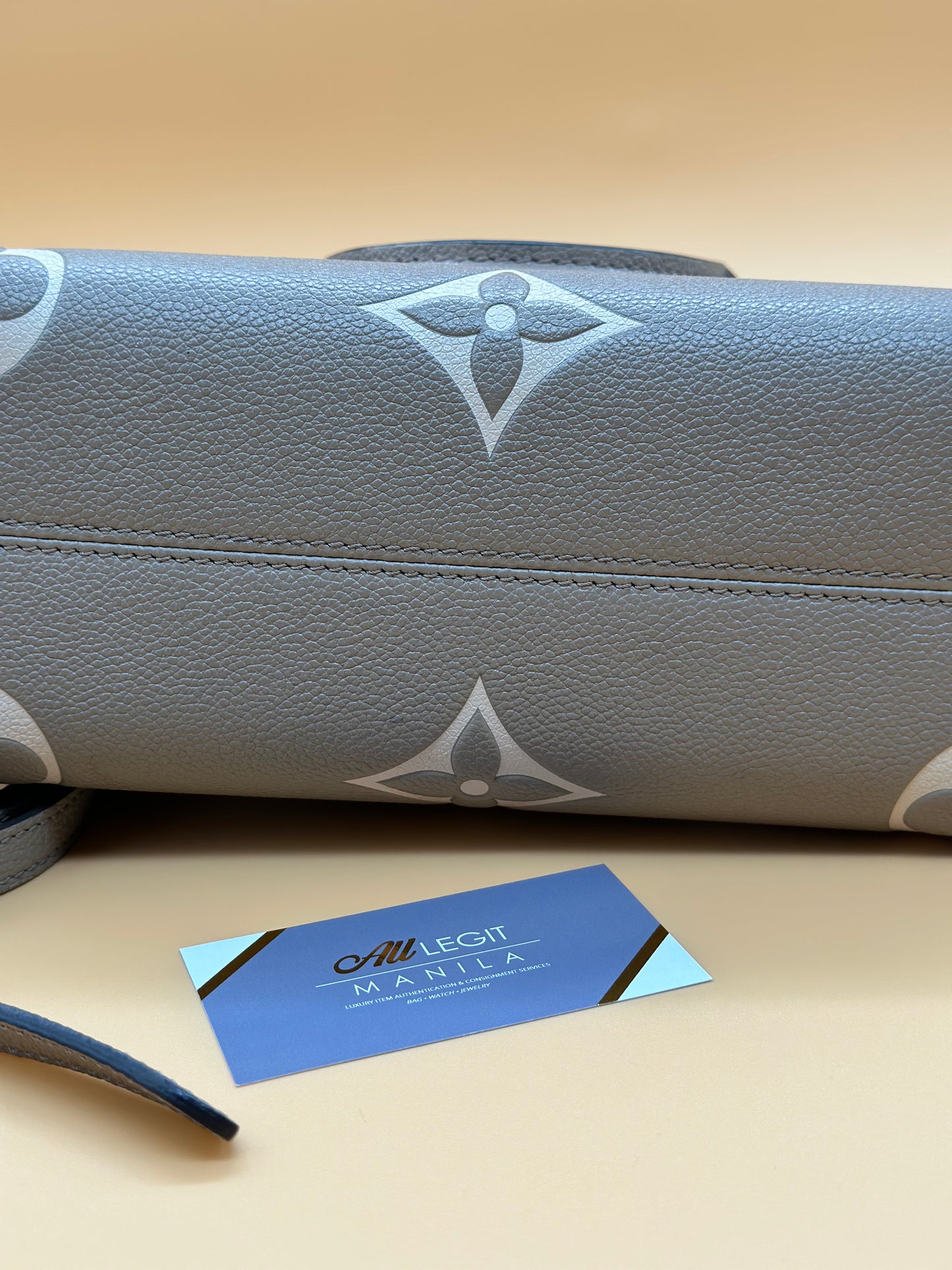 LV OTG BI-COLOR EMPREINTE PM