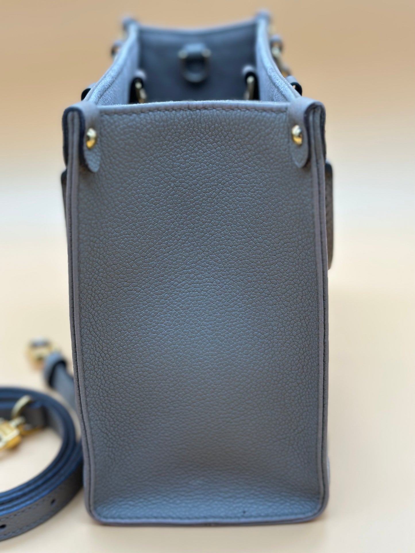 LV OTG BI-COLOR EMPREINTE PM